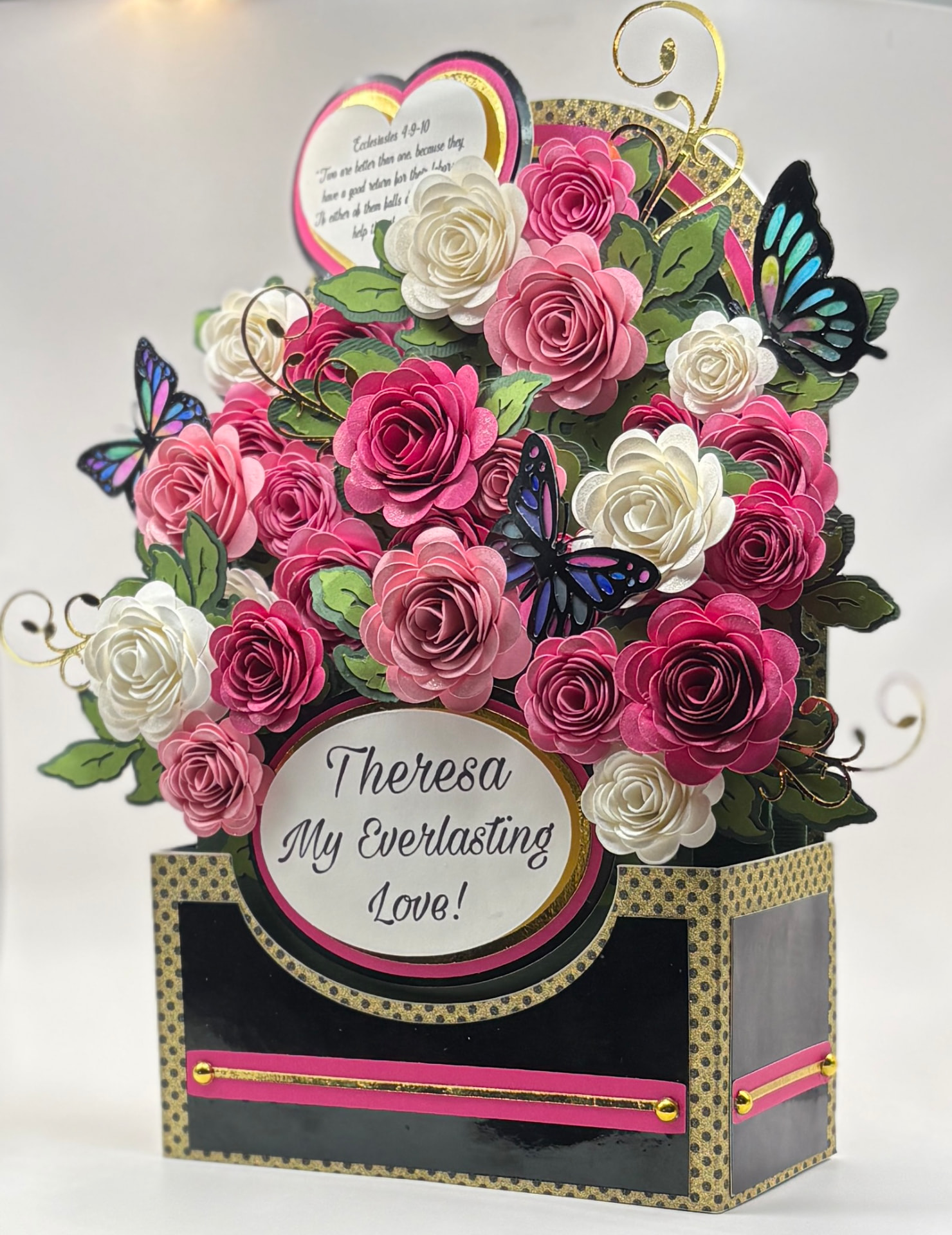 Handcrafted dimensional paper rose keepsake in a black and gold box with a personalized plaque
